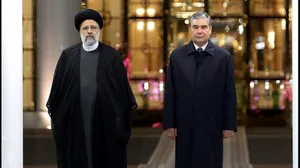 تصاویر ورود آیت الله رئیسی به فرودگاه بین المللی عشق آباد و استقبال رسمی رئیس جمهور ترکمنستان
